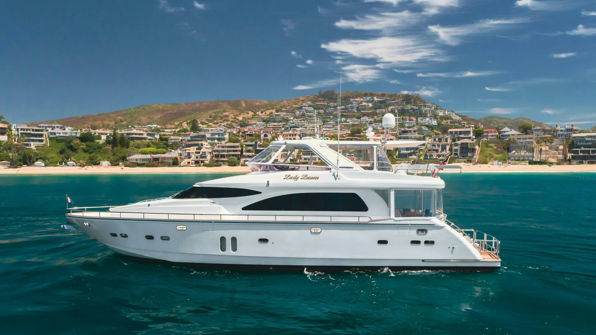 a white yacht in the water aboard LADY LAURA Yacht for Sale