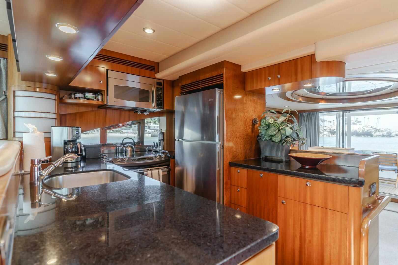 a kitchen with a large island aboard LADY LAURA Yacht for Sale