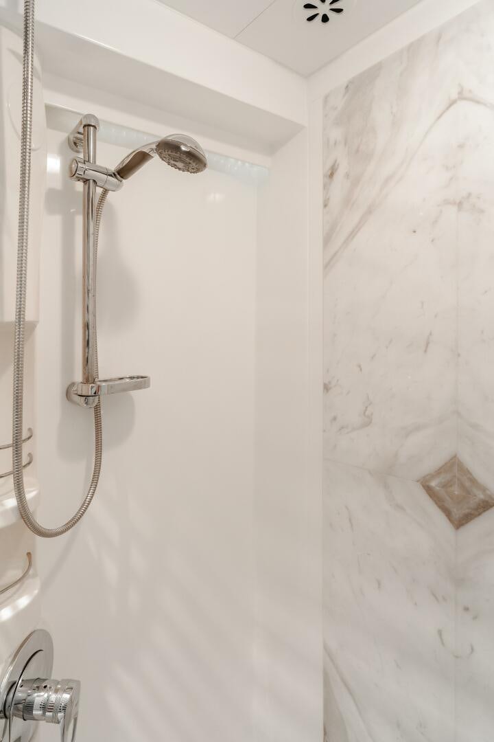 a shower with a glass door aboard LADY LAURA Yacht for Sale