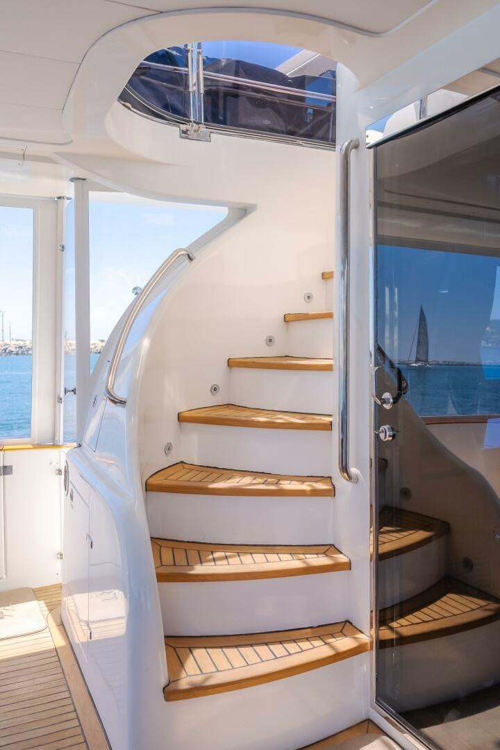 a large white vehicle with a wooden frame aboard LADY LAURA Yacht for Sale