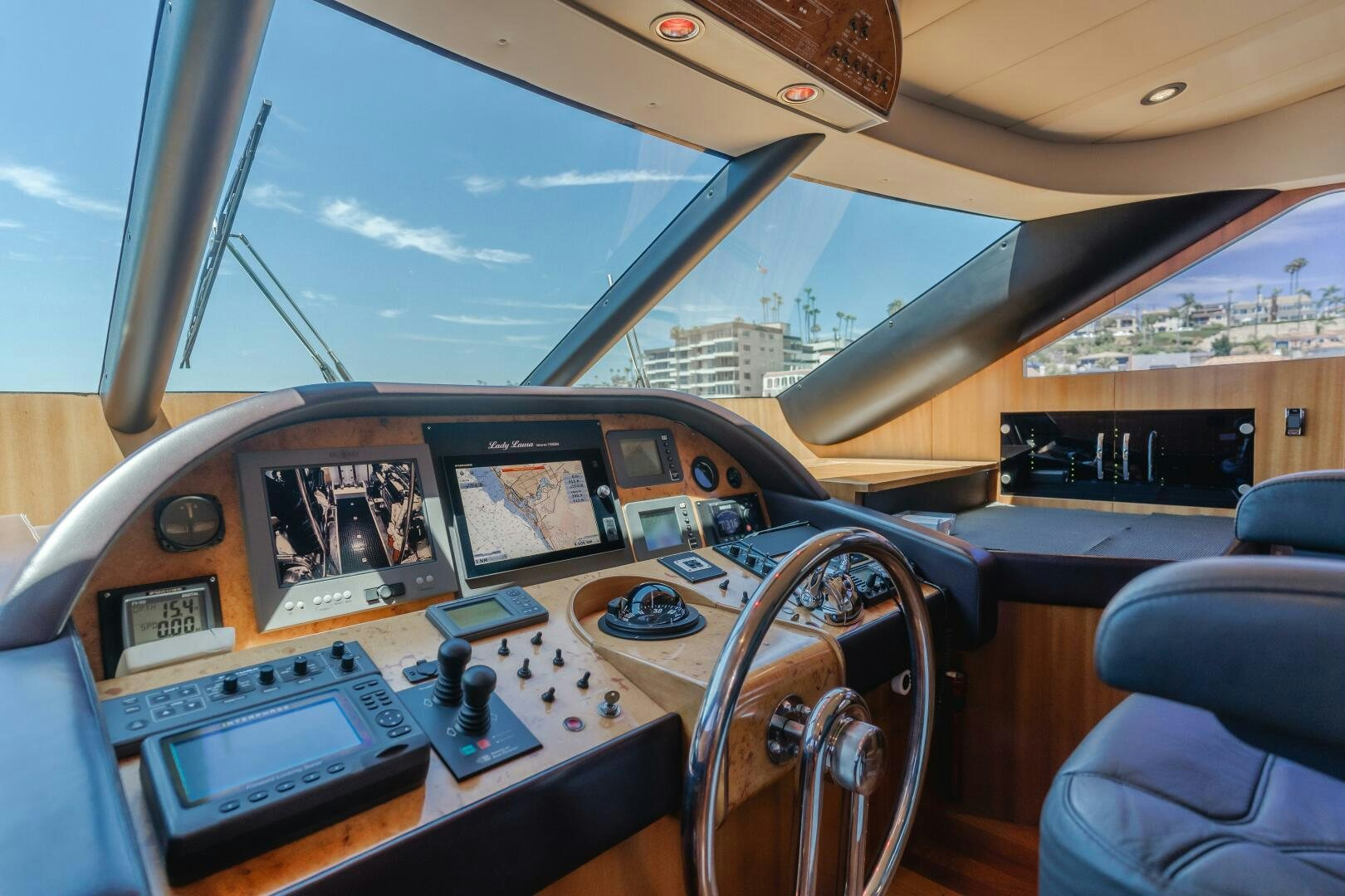 inside of a vehicle with a music player and a large window aboard LADY LAURA Yacht for Sale