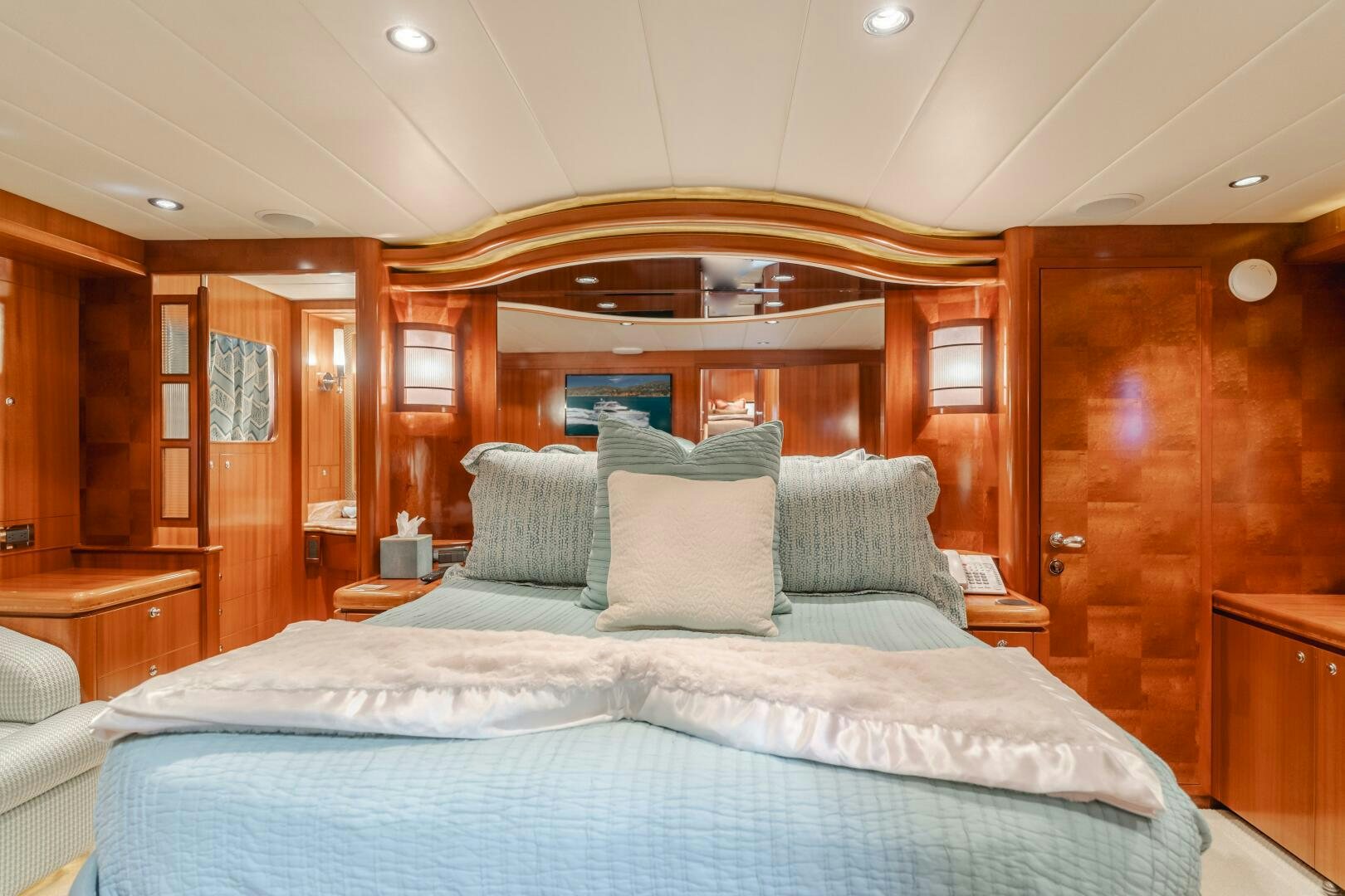a bed with pillows aboard LADY LAURA Yacht for Sale
