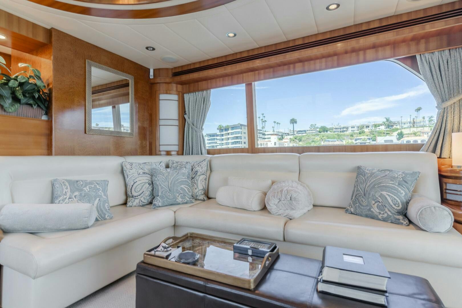 a living room with a large window aboard LADY LAURA Yacht for Sale