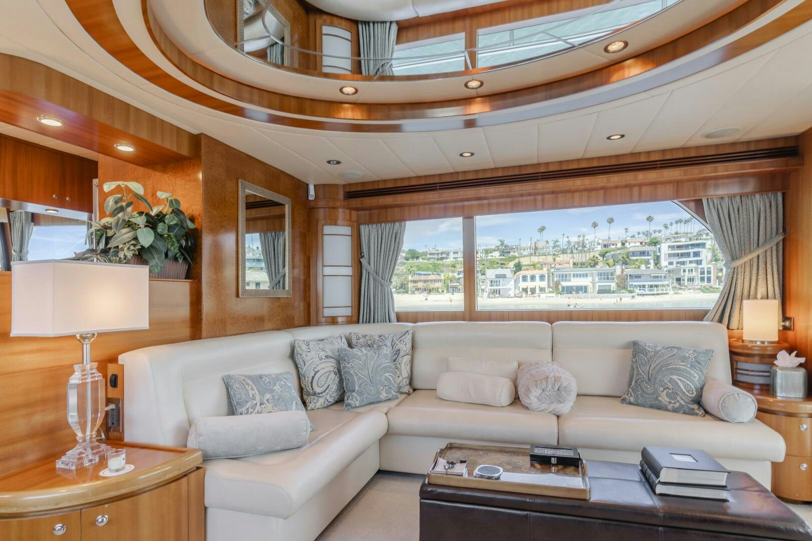 a living room with a large window aboard LADY LAURA Yacht for Sale