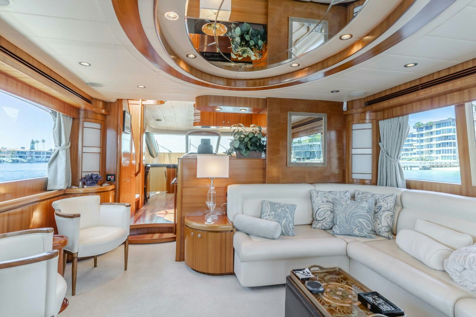 a living room with a couch and a table aboard LADY LAURA Yacht for Sale