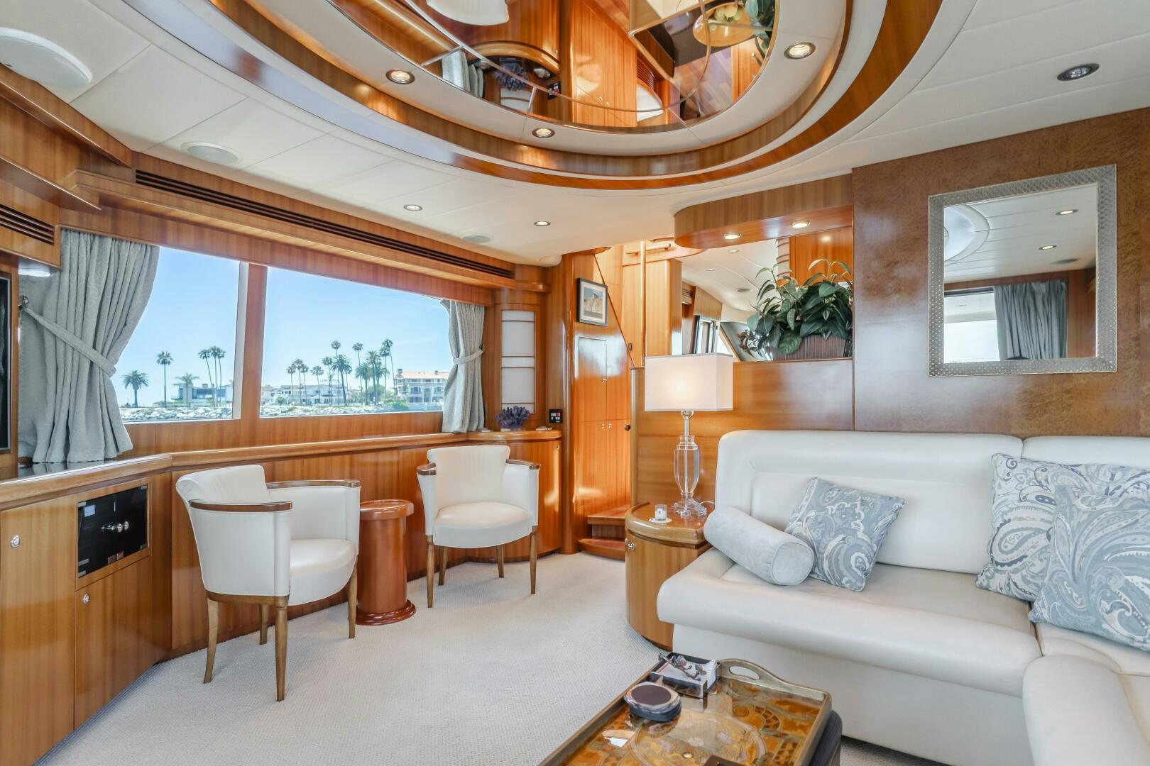 a living room with a couch and a table aboard LADY LAURA Yacht for Sale
