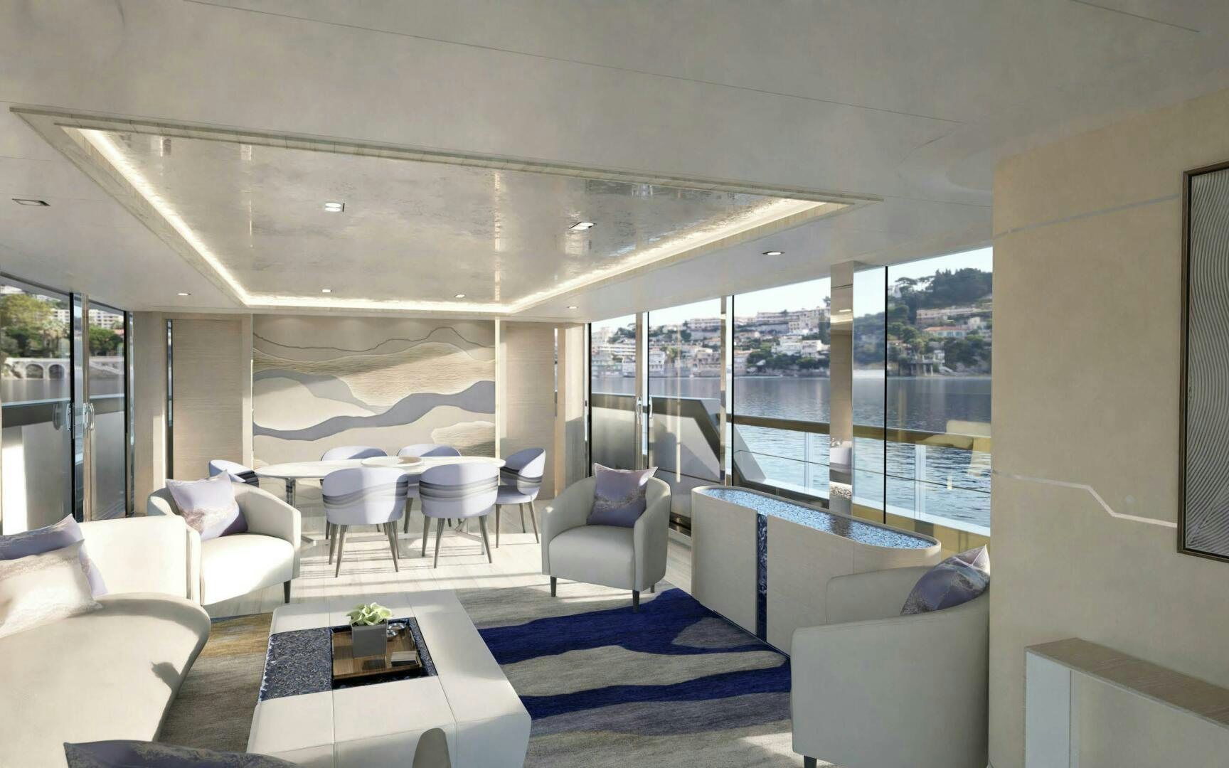 a room with a large blue rug and white furniture aboard PROJECT ABACOS Yacht for Sale