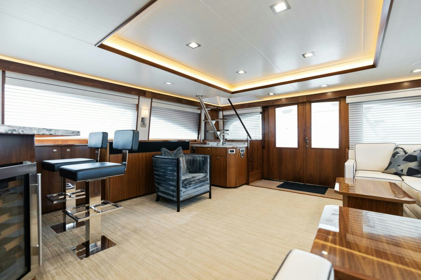 a room with a wood floor and a wood floor and a ladder aboard SOLONIAN Yacht for Sale