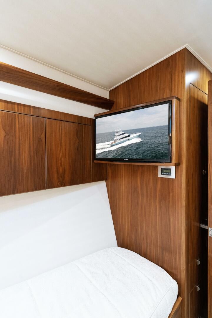 a television on a wall aboard SOLONIAN Yacht for Sale