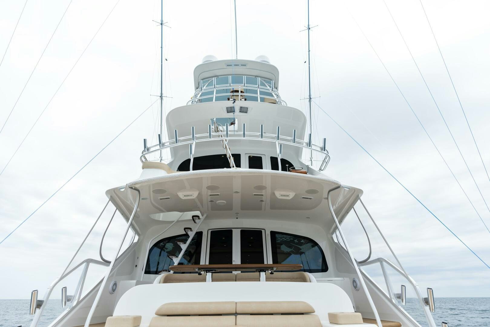 a white boat with a white sail aboard SOLONIAN Yacht for Sale