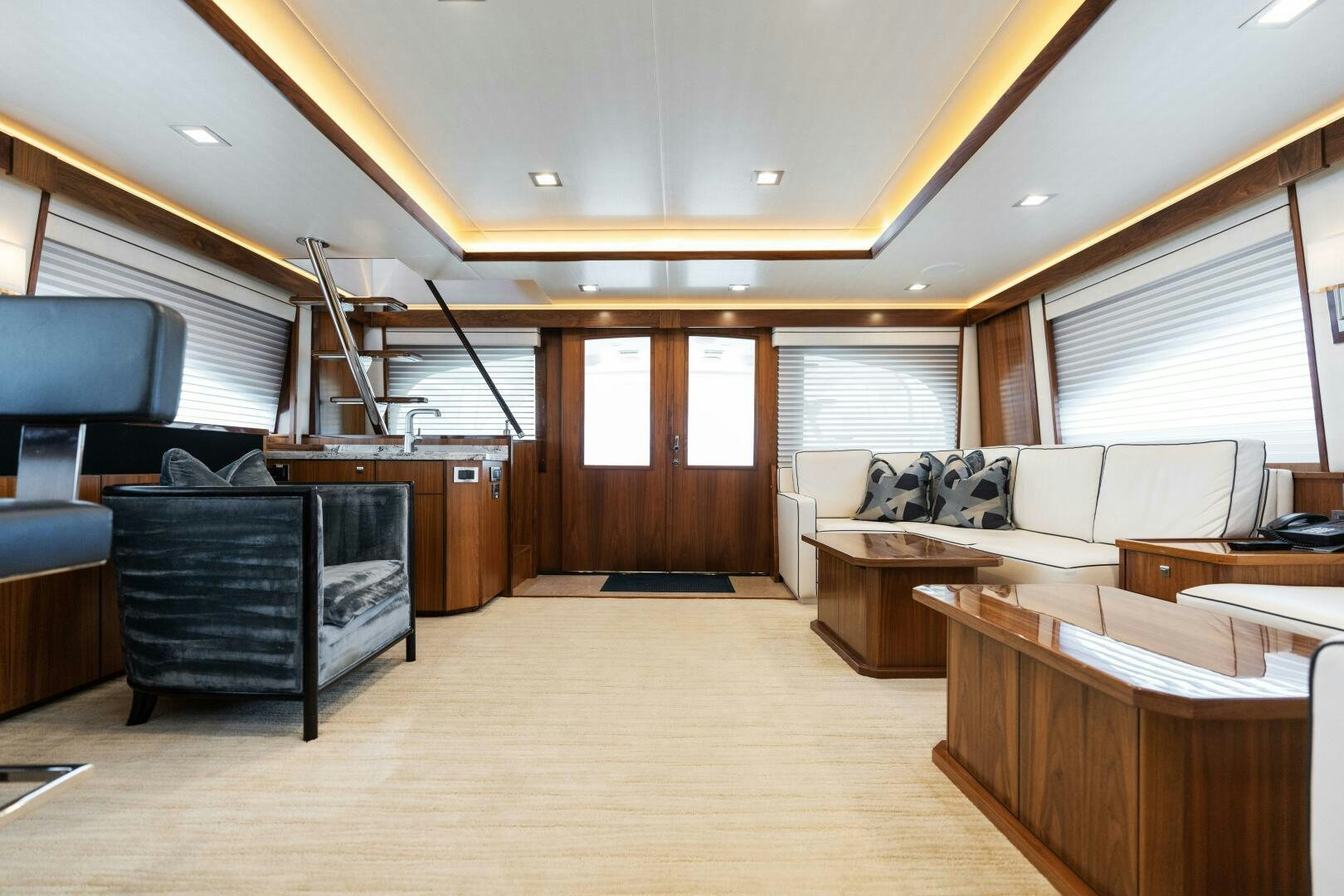 a living room with a large window aboard SOLONIAN Yacht for Sale
