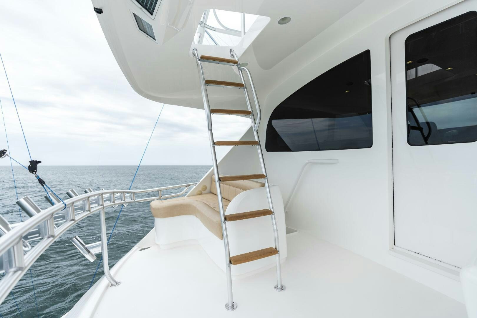 a white boat with a ladder aboard SOLONIAN Yacht for Sale