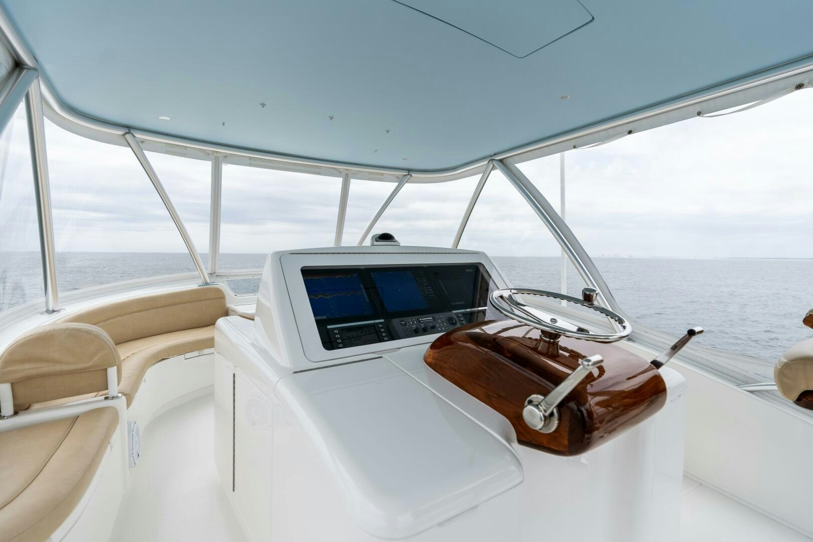 a boat with a laptop and a keychain on the front aboard SOLONIAN Yacht for Sale