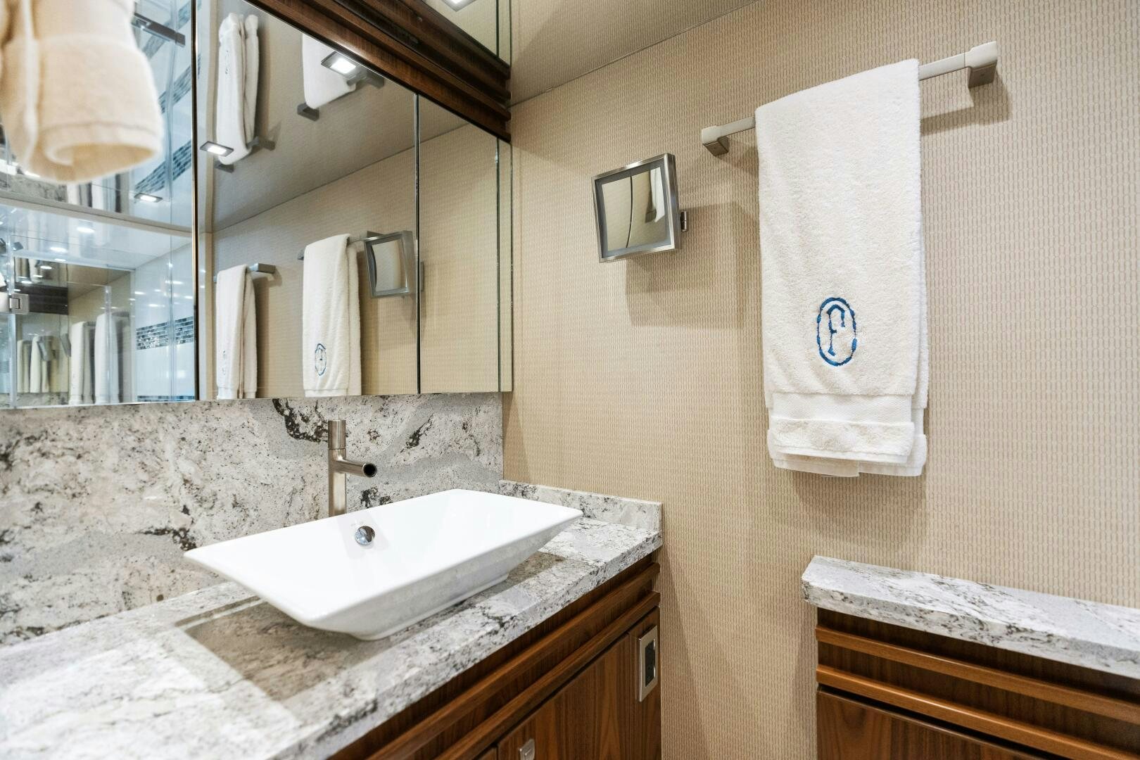 a bathroom with a marble countertop aboard SOLONIAN Yacht for Sale