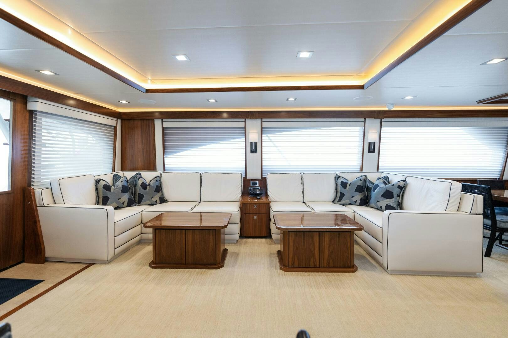 a living room with a couch and a table aboard SOLONIAN Yacht for Sale
