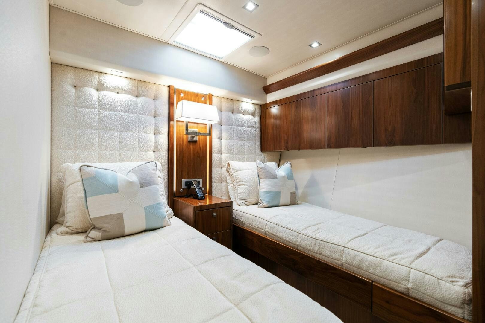 a couple of beds in a hotel room aboard SOLONIAN Yacht for Sale
