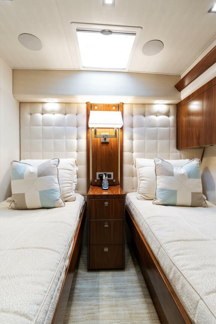 a couple of beds in a room aboard SOLONIAN Yacht for Sale
