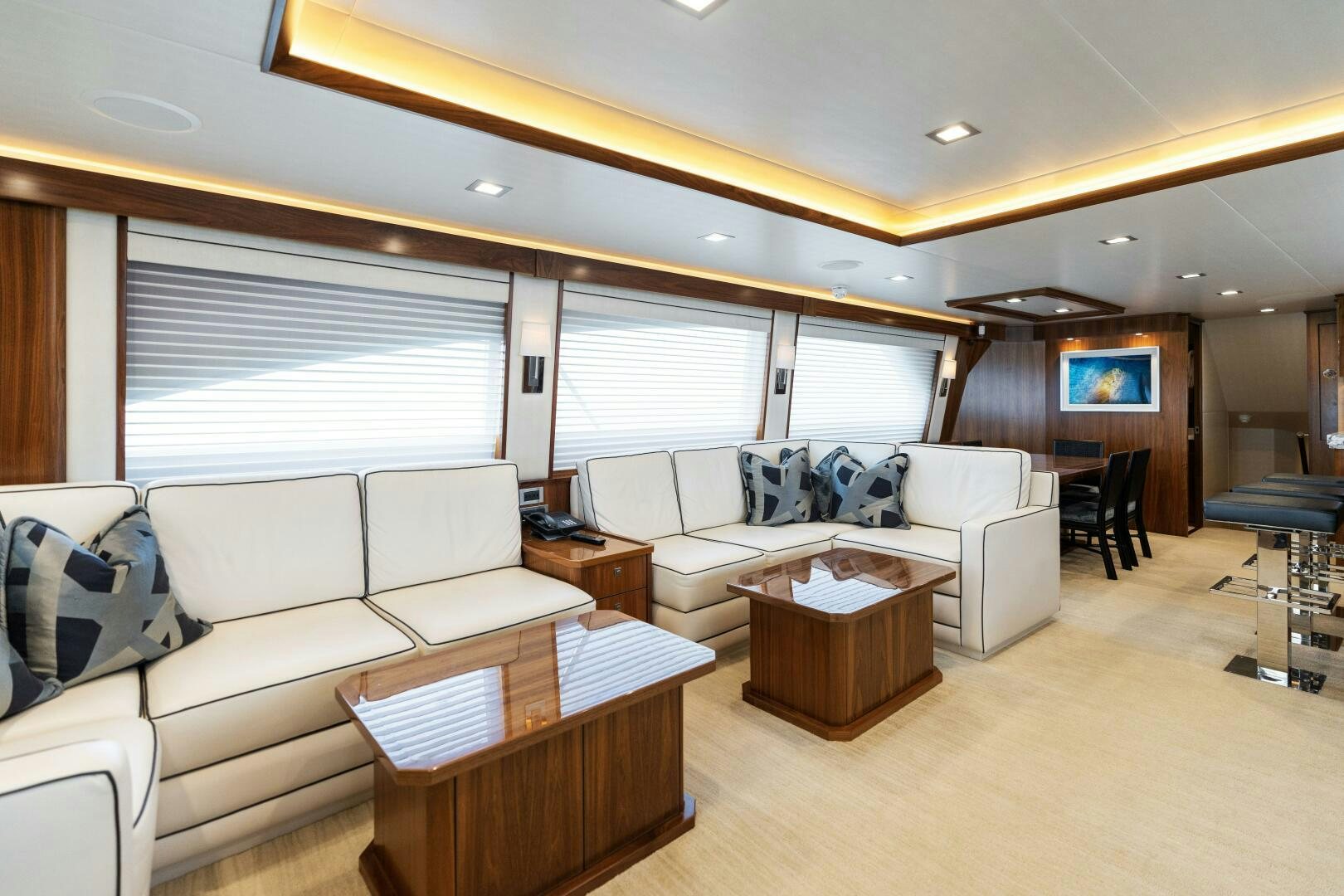 a living room with a couch and a table aboard SOLONIAN Yacht for Sale