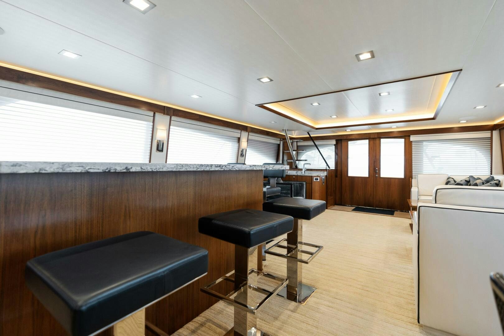 a room with a table and chairs aboard SOLONIAN Yacht for Sale