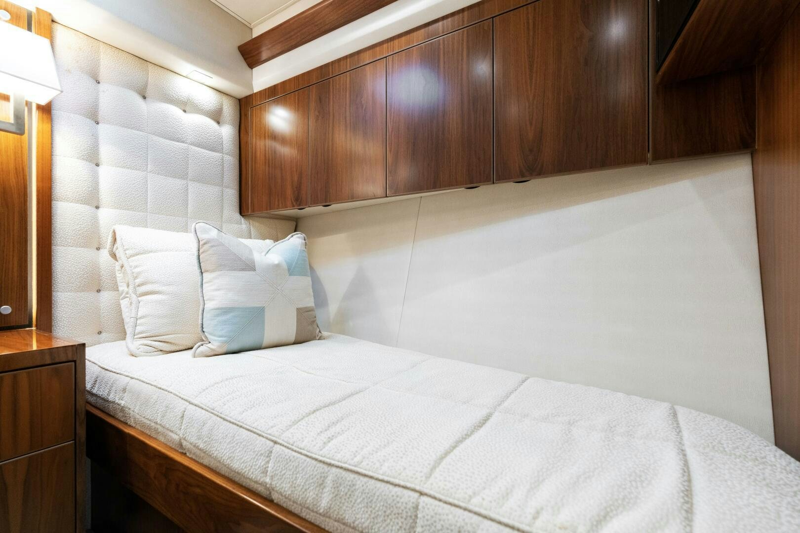 a bed with white sheets aboard SOLONIAN Yacht for Sale