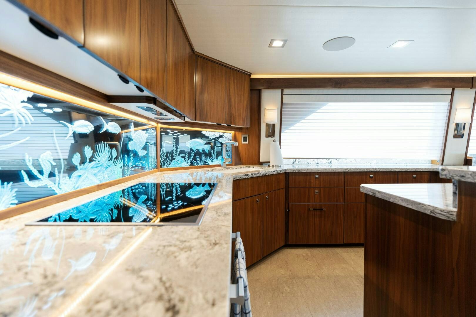 a kitchen with a large glass window aboard SOLONIAN Yacht for Sale
