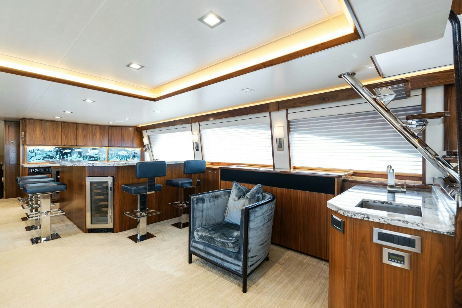 a room with a couch and chairs aboard SOLONIAN Yacht for Sale