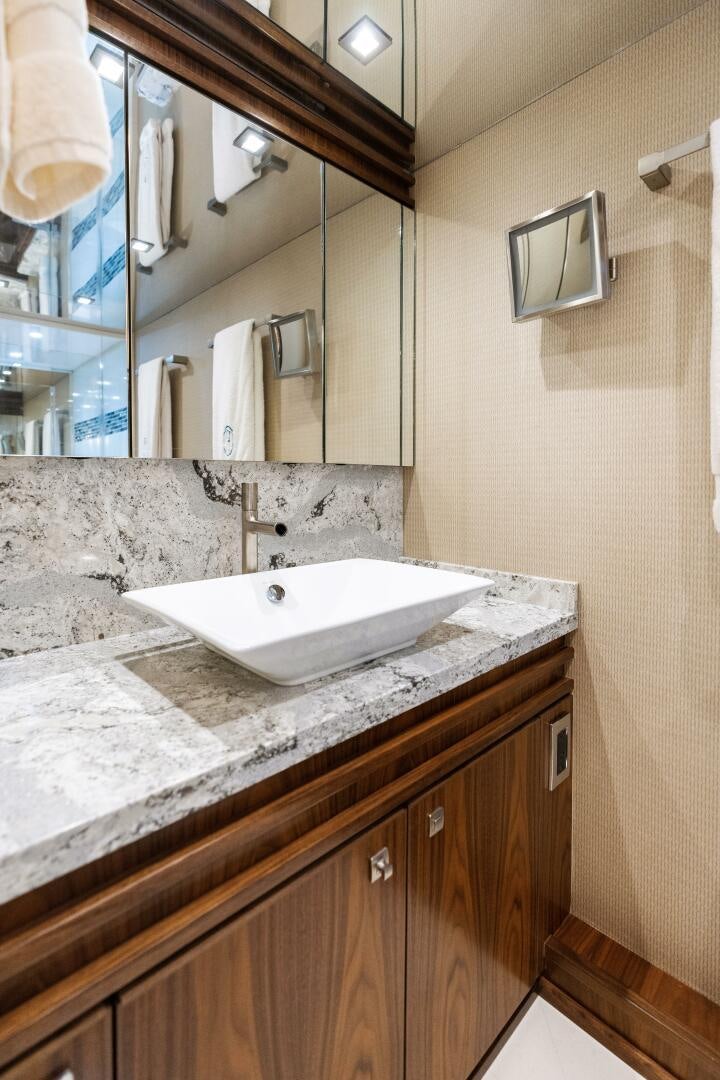 a bathroom with a marble counter top aboard SOLONIAN Yacht for Sale