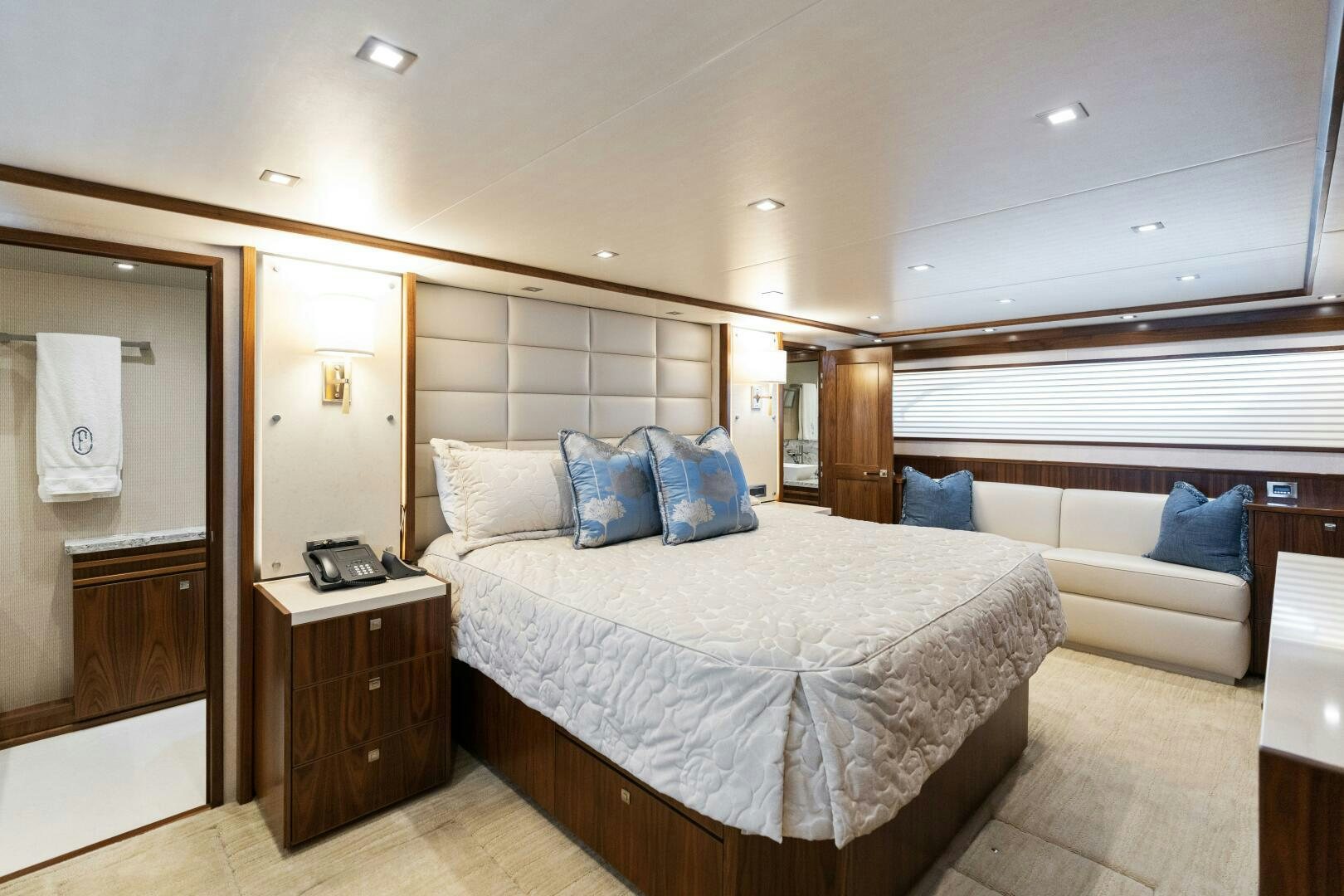 a room with a bed and a mirror aboard SOLONIAN Yacht for Sale