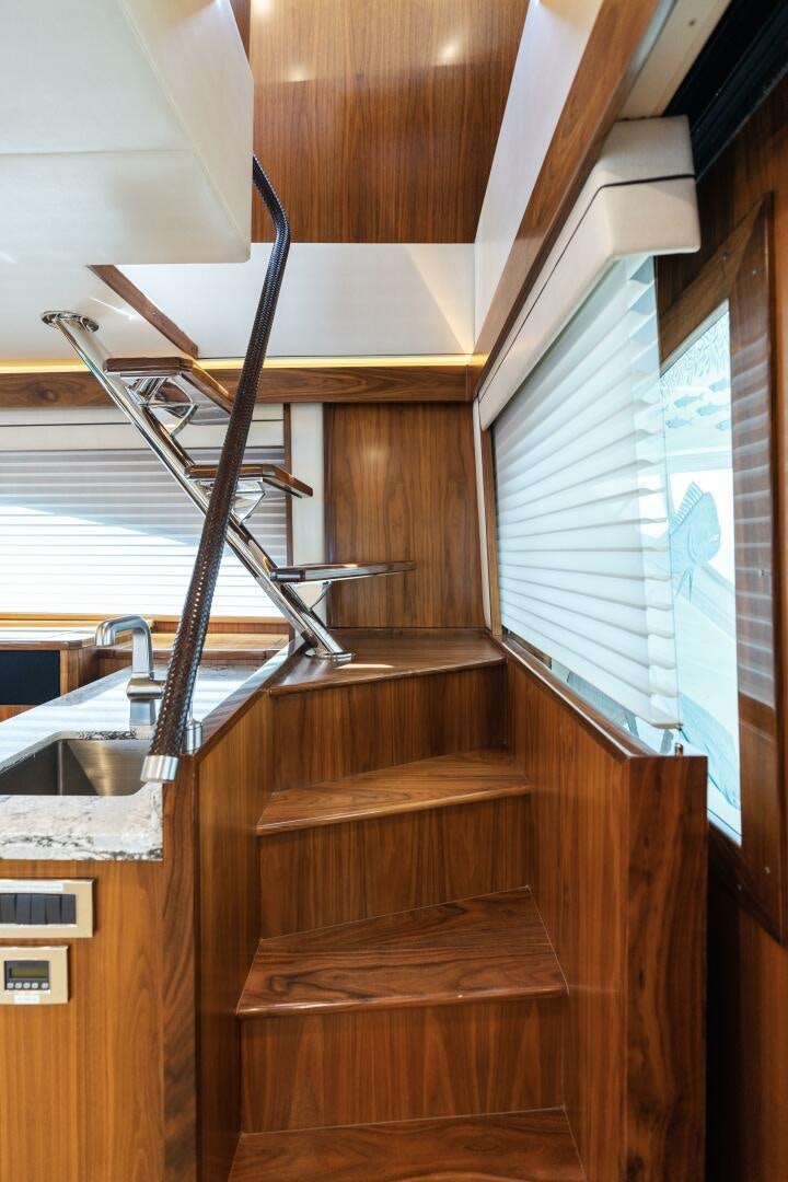 a wooden staircase in a house aboard SOLONIAN Yacht for Sale