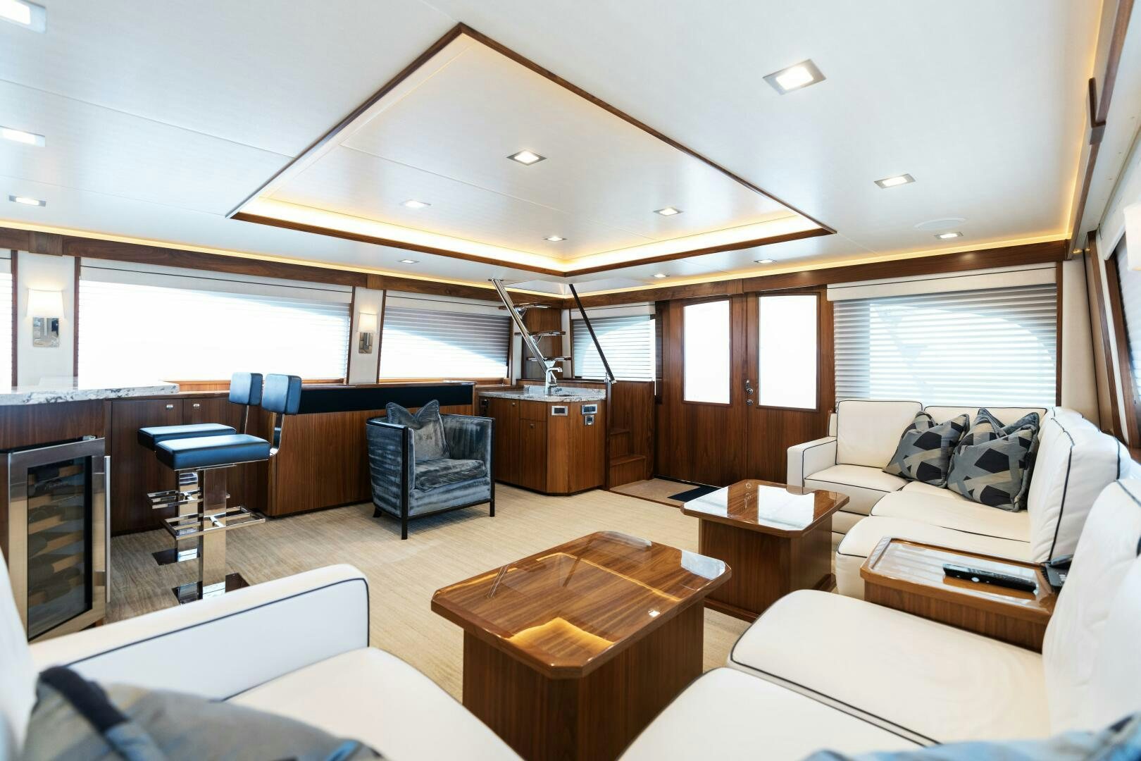 a living room with a couch and a table aboard SOLONIAN Yacht for Sale