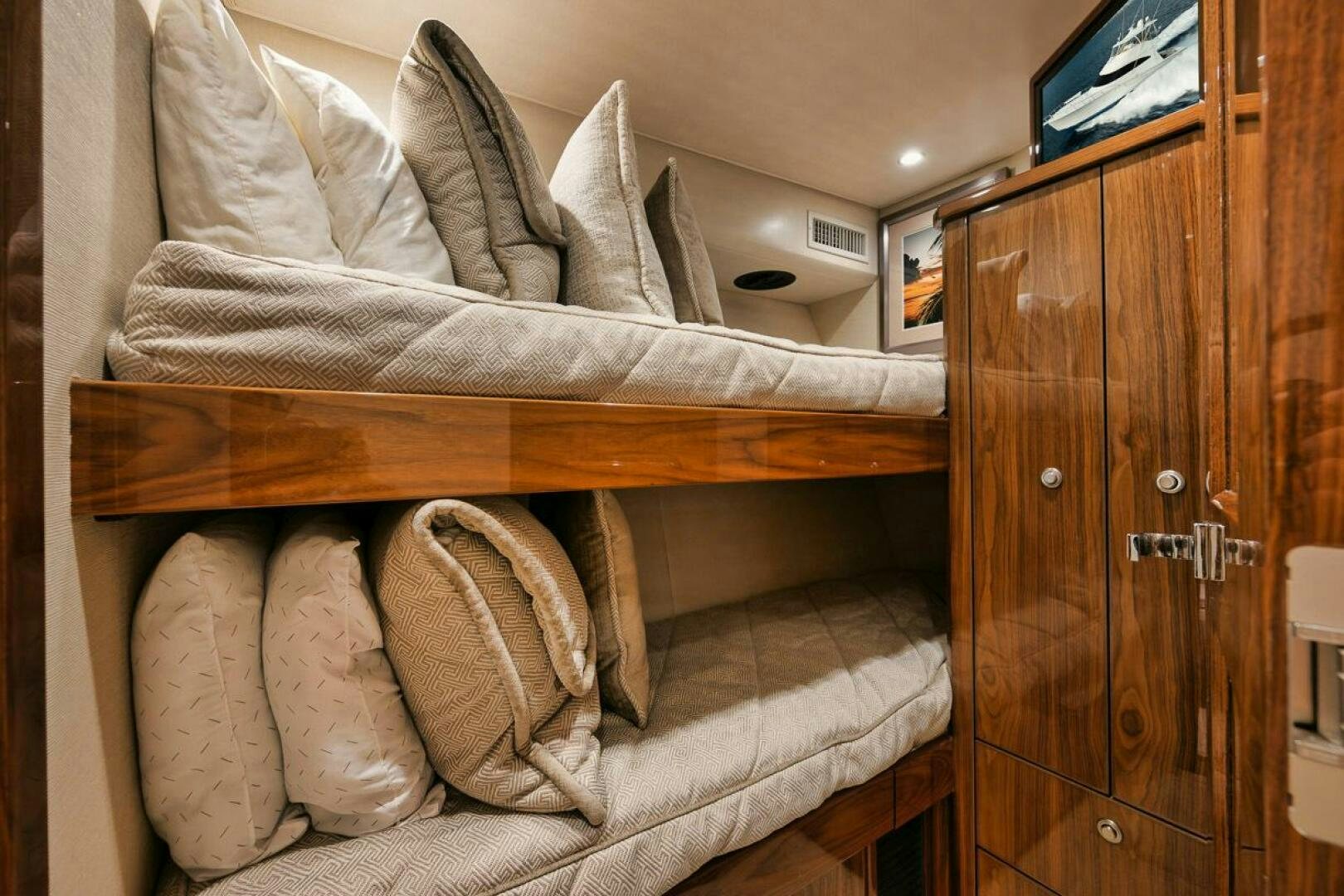 a bed with white sheets aboard WHY KNOT Yacht for Sale
