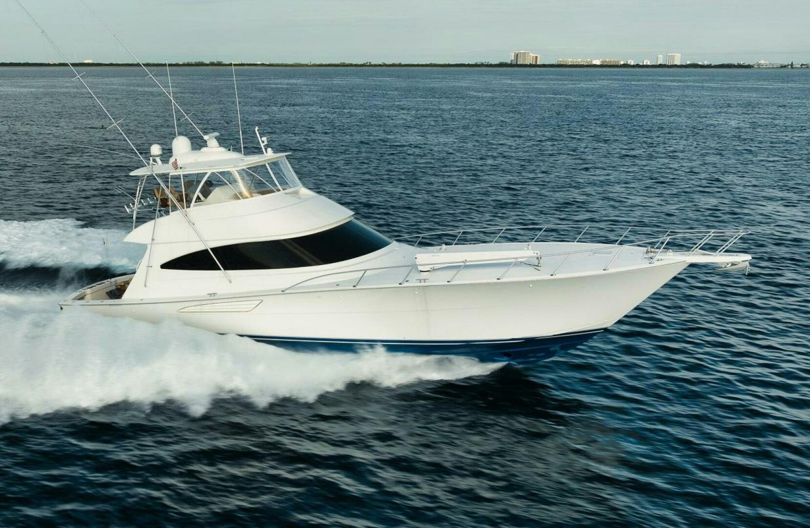 a white boat in the water aboard WHY KNOT Yacht for Sale