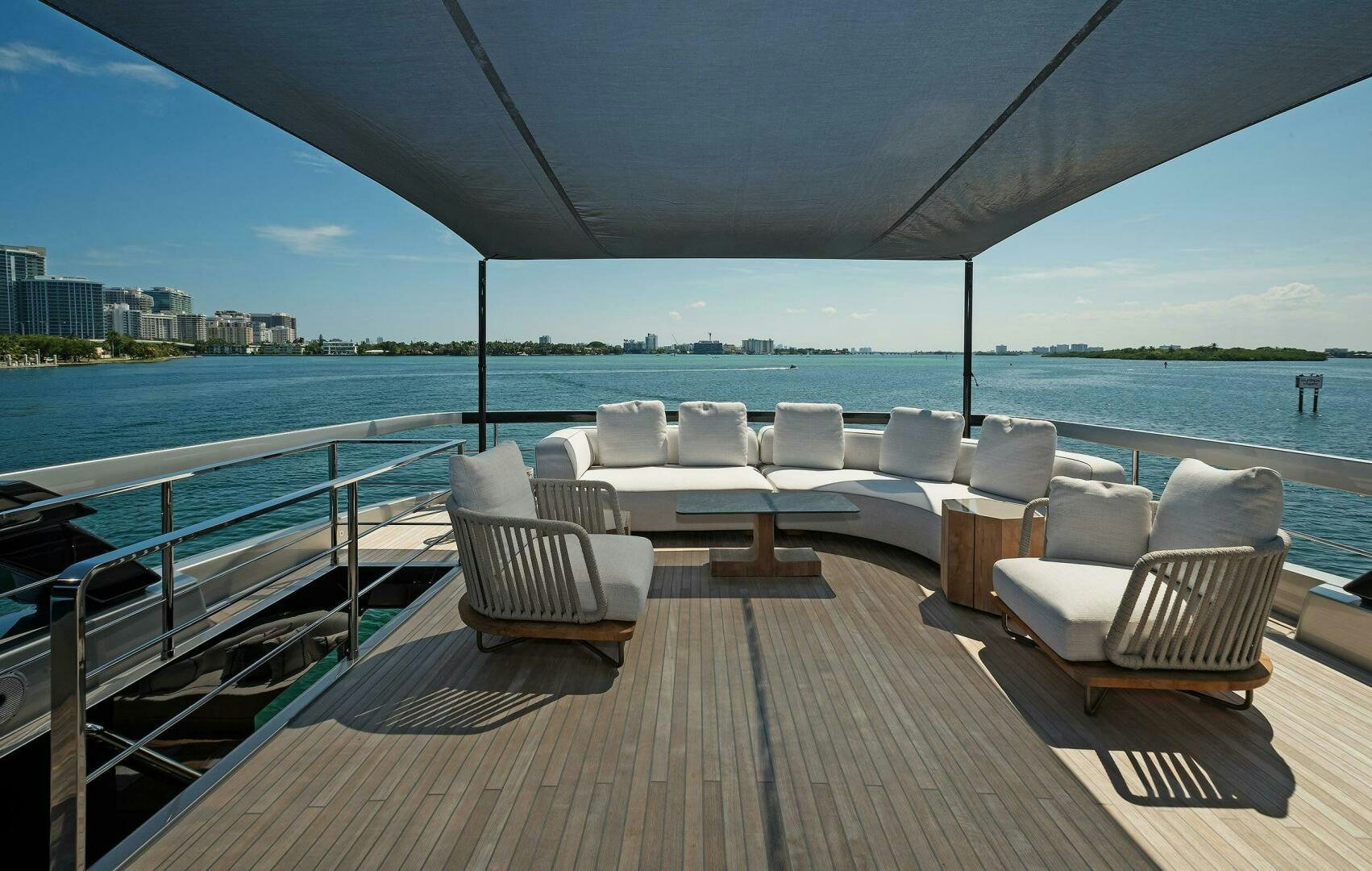 a deck with chairs on it aboard ALEGRA Yacht for Sale