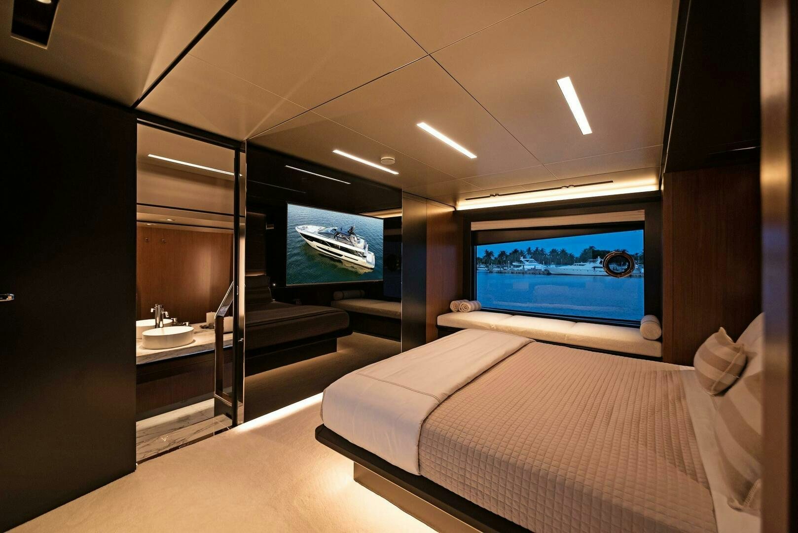 a room with a bed and a tv aboard ALEGRA Yacht for Sale