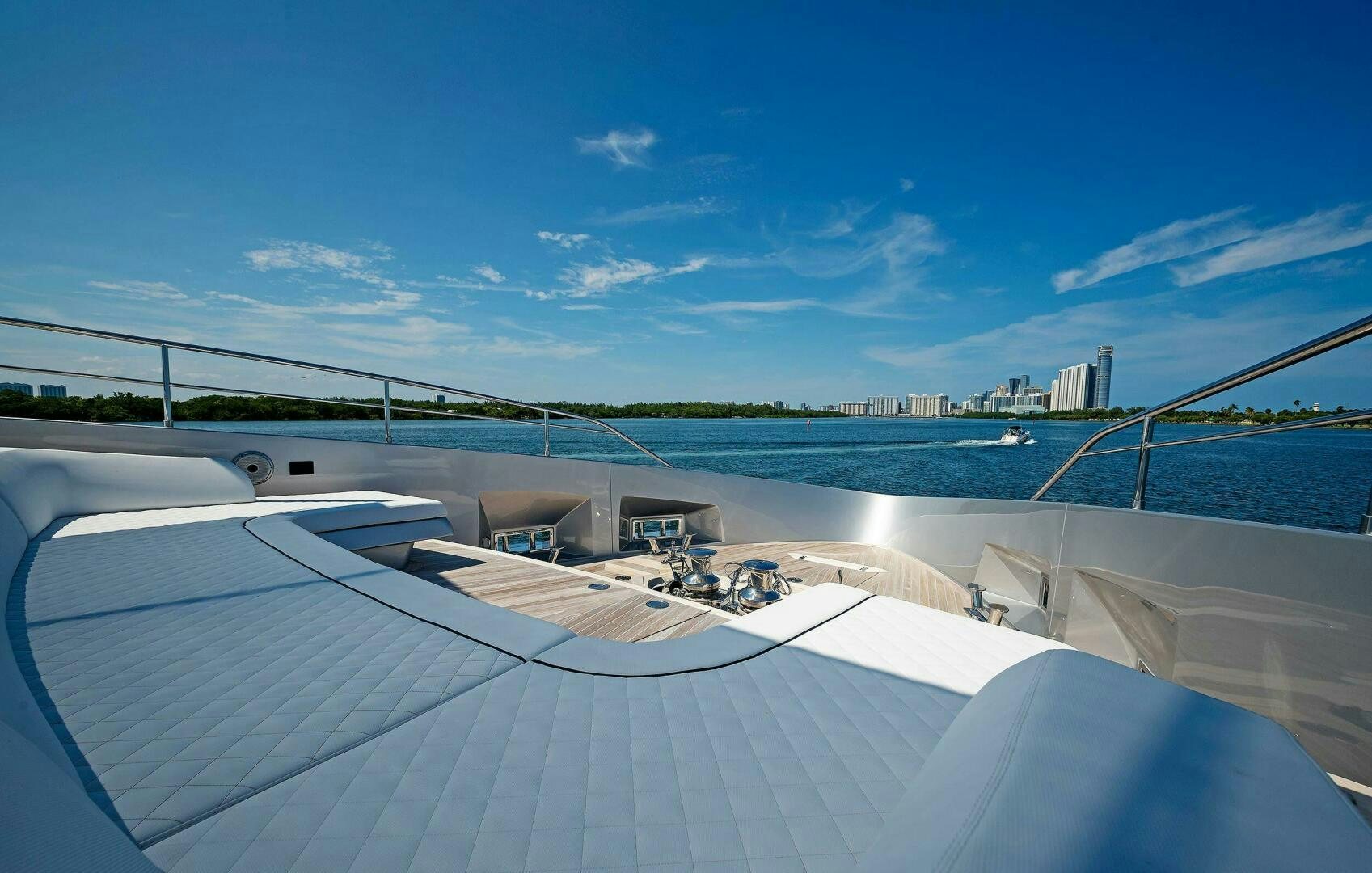 a rooftop with a view of a city and a body of water aboard ALEGRA Yacht for Sale