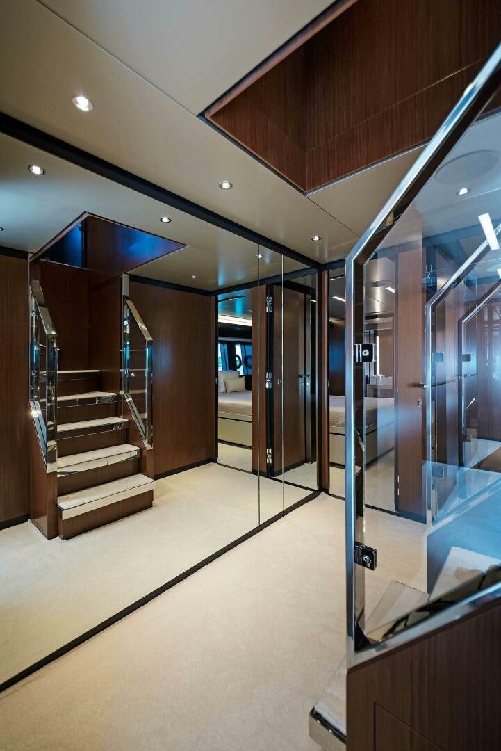 a hallway with glass doors aboard ALEGRA Yacht for Sale