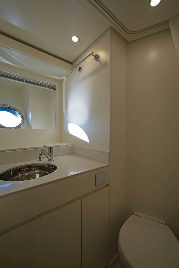 a bathroom with a sink and a toilet aboard ALEGRA Yacht for Sale
