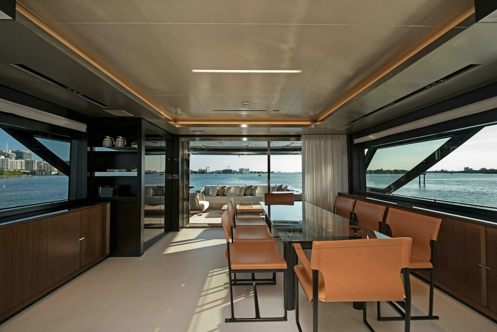 a room with a table and chairs aboard ALEGRA Yacht for Sale