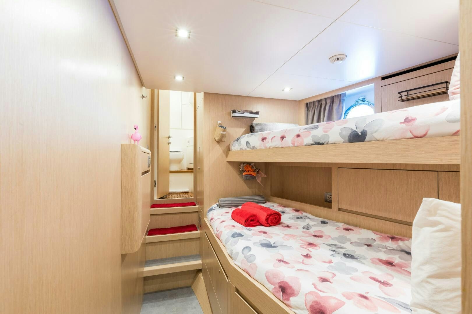 a room with bunk beds aboard GLORY Yacht for Sale