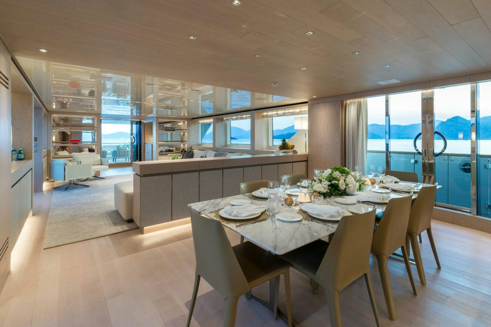 a large dining table in a large kitchen aboard GLORY Yacht for Sale