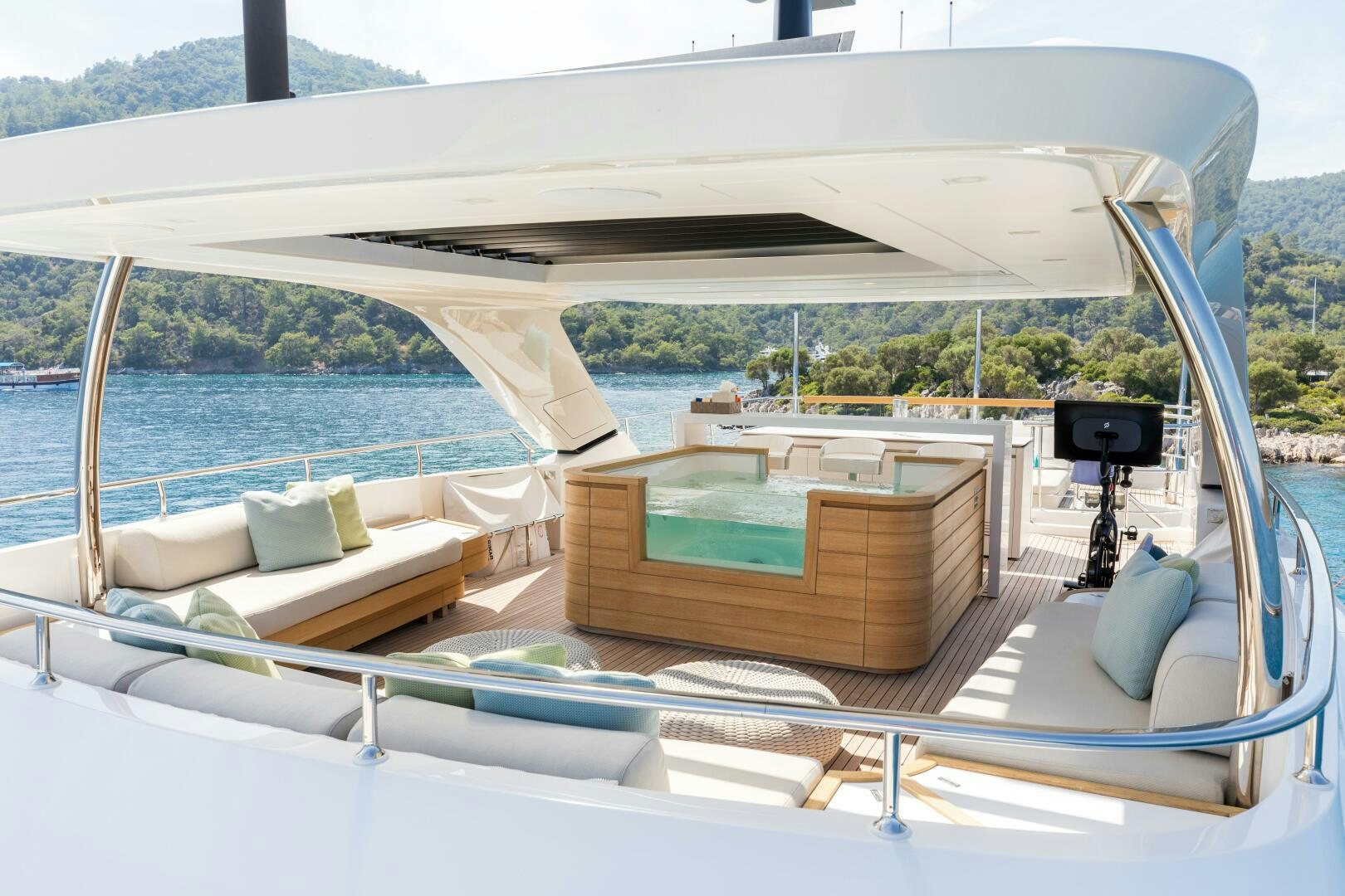 a large white tent with a couch and a pool aboard GLORY Yacht for Sale