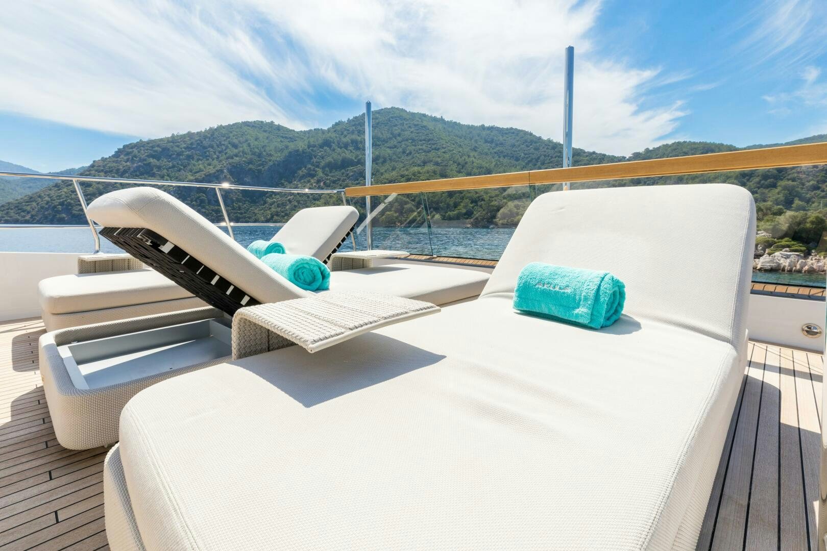 a deck with a boat and a dock and a body of water aboard GLORY Yacht for Sale