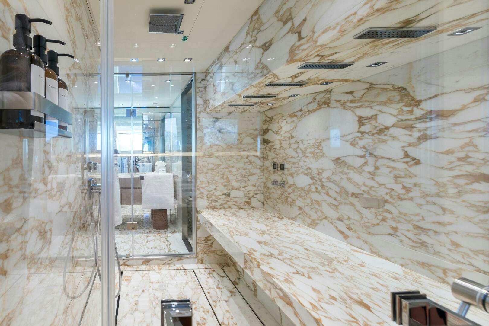 a room with a large rock wall aboard GLORY Yacht for Sale