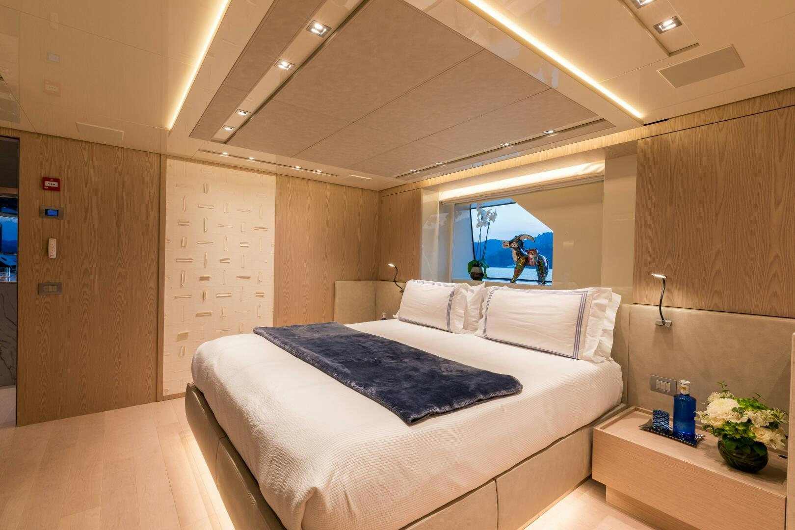 a room with a bed and a tv aboard GLORY Yacht for Sale