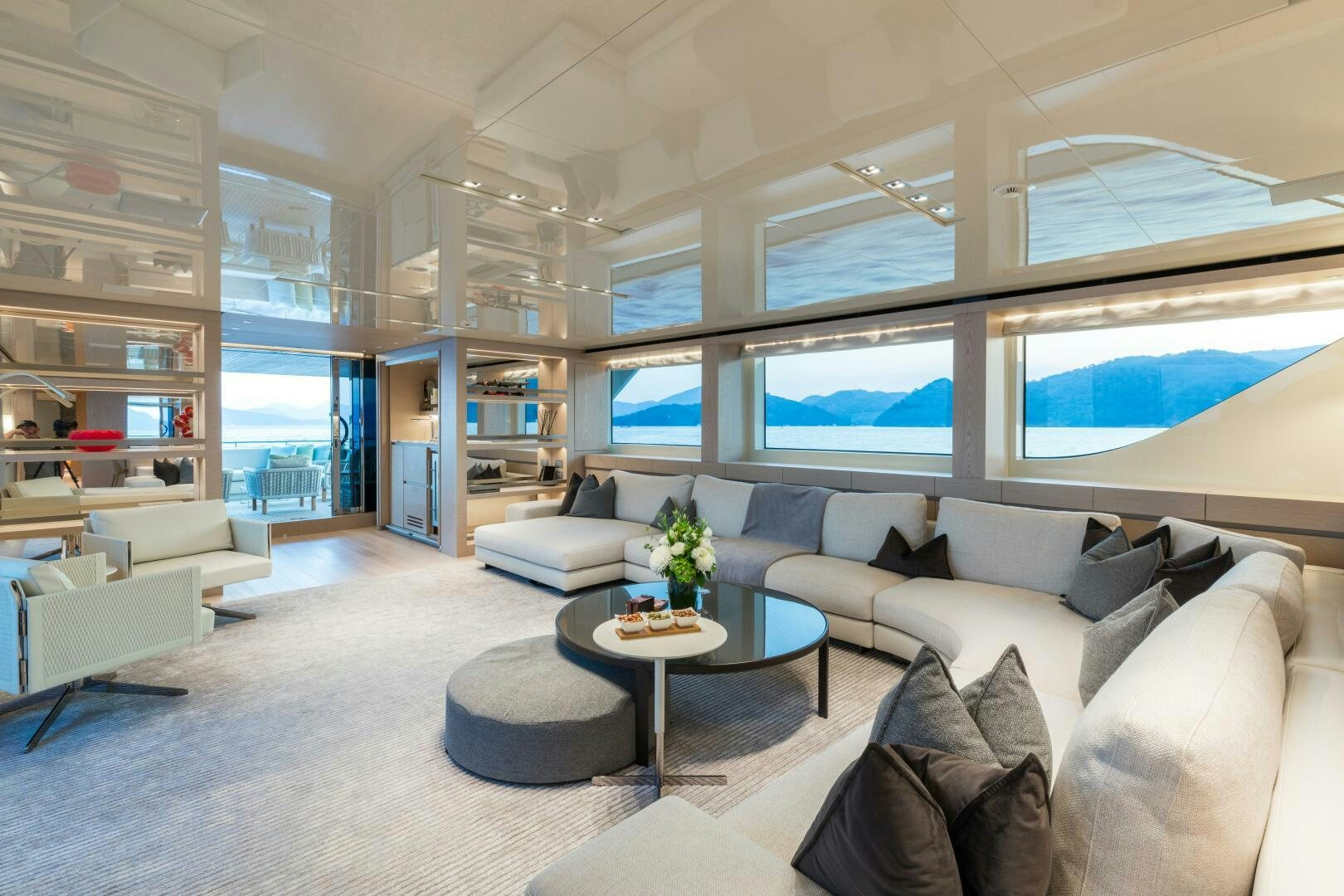 a living room with a large window aboard GLORY Yacht for Sale