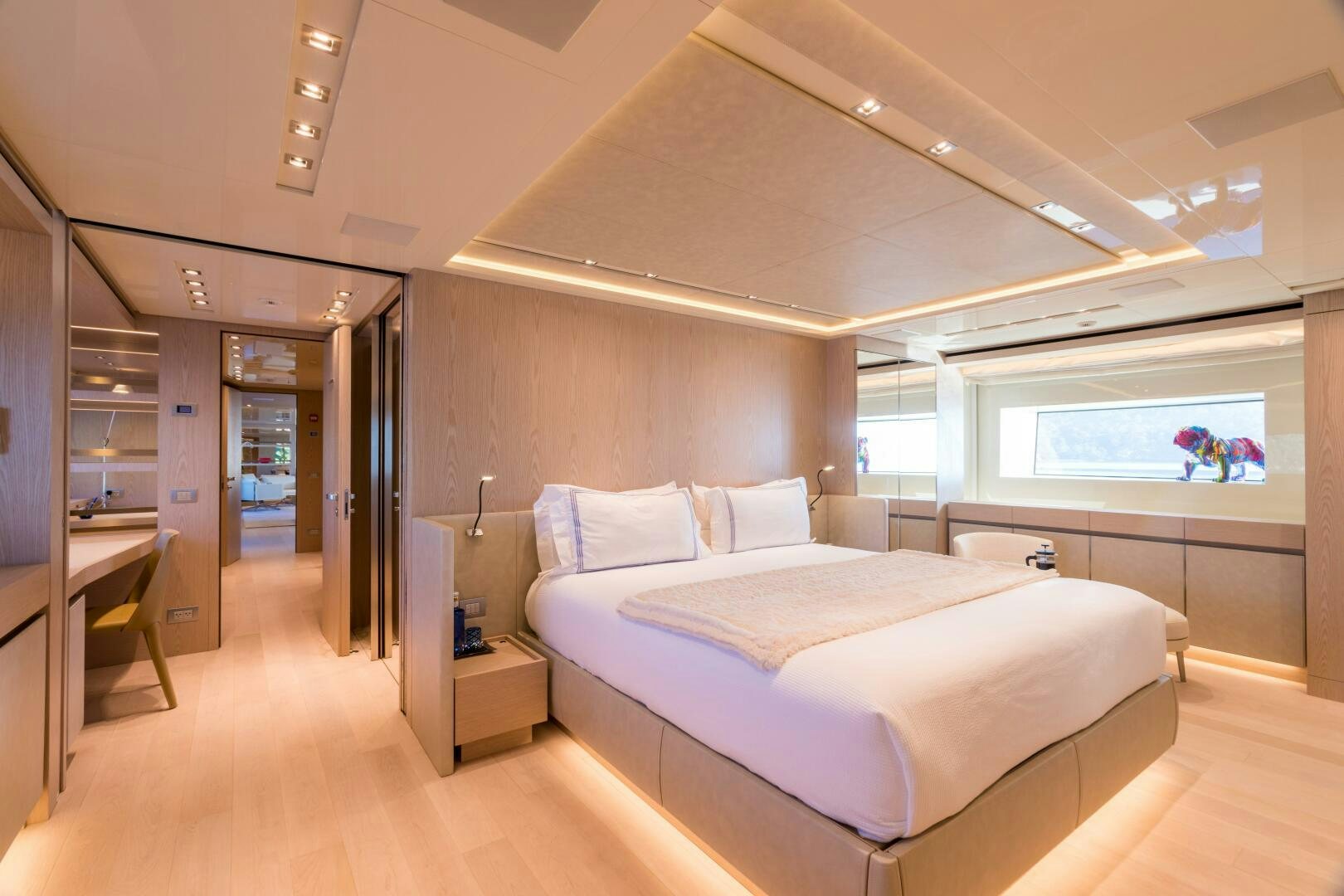 a bedroom with a bed aboard GLORY Yacht for Sale