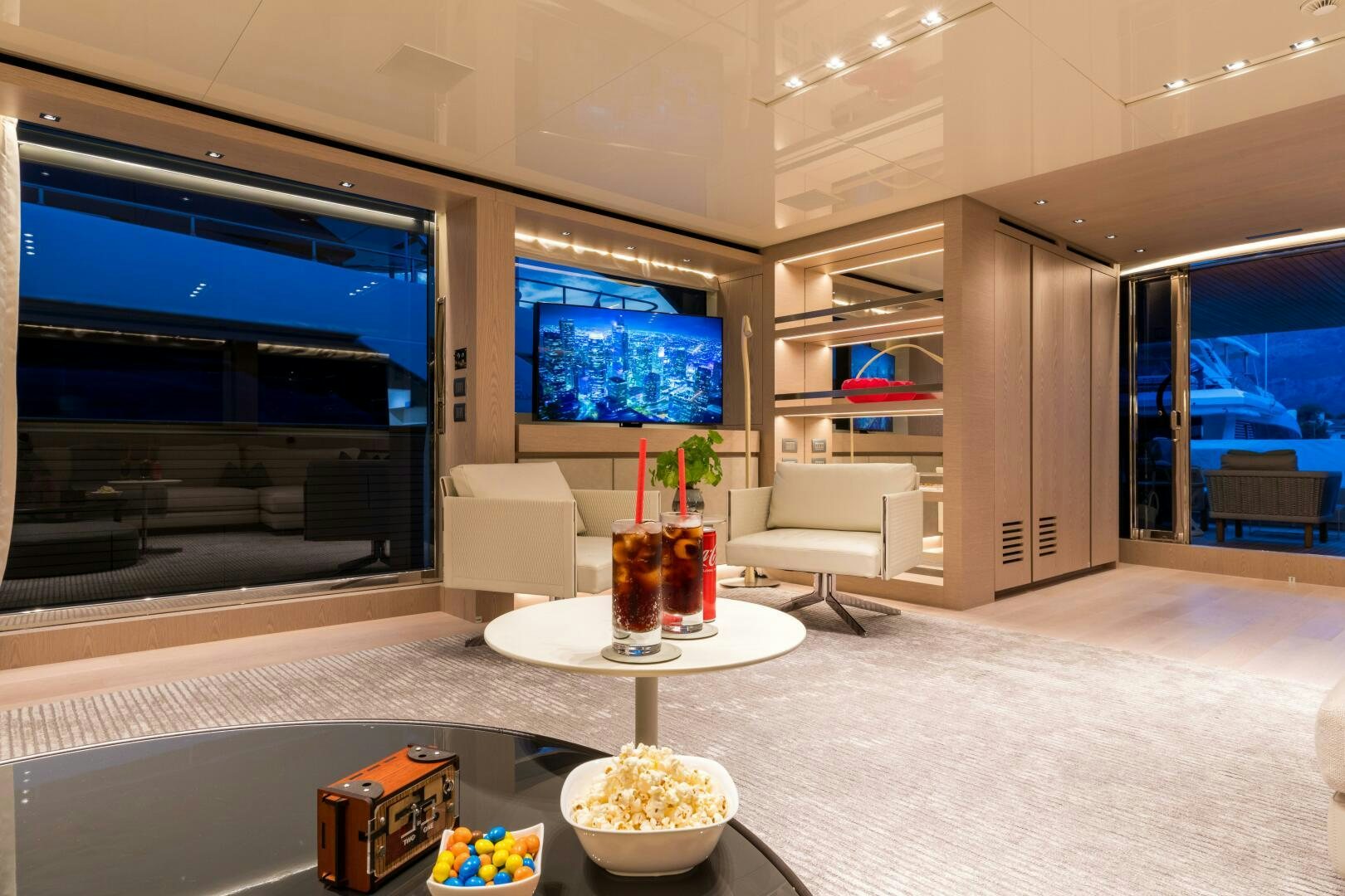 a living room with a large window aboard GLORY Yacht for Sale