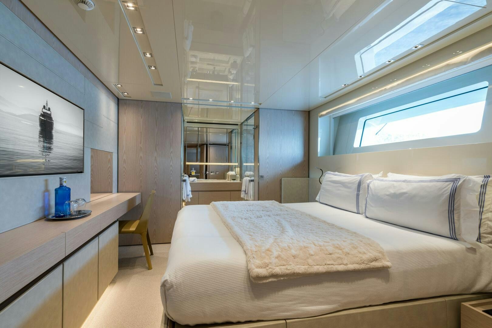 a bed in a room aboard GLORY Yacht for Sale