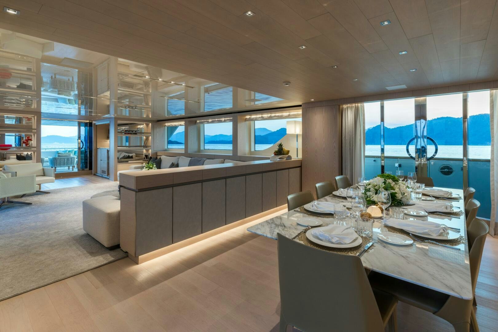 a large kitchen with a dining table aboard GLORY Yacht for Sale