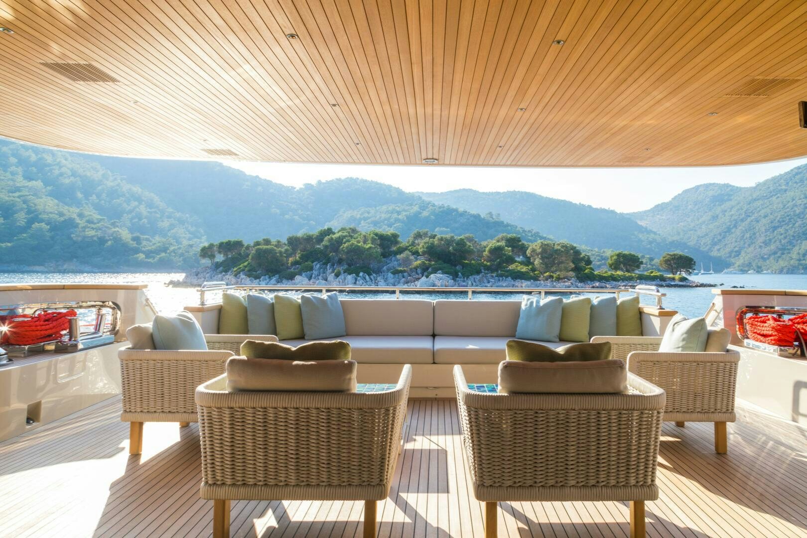 a patio with chairs and a table aboard GLORY Yacht for Sale